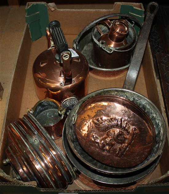 A Victorian copper saucepan, five Victorian copper jelly moulds and a copper kettle and two pots